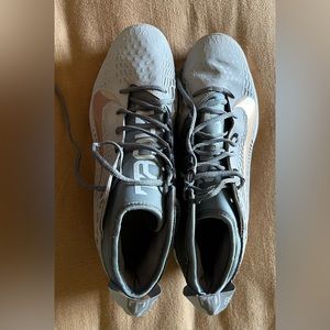 Nike baseball cleats, grey with copper bottoms, like new
